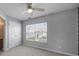 Bedroom with natural light, ceiling fan and closet at 13376 Calloway Glen Dr, Charlotte, NC 28273