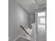 Upstairs hallway with carpet and view to open bedroom at 13376 Calloway Glen Dr, Charlotte, NC 28273