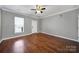 Bright, spacious room with large window and hardwood floors at 13376 Calloway Glen Dr, Charlotte, NC 28273