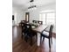 Bright dining room with a wooden table, six chairs, overhead lighting and hardwood floors at 1643 Mayfair Dr, Conover, NC 28613