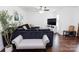 Comfortable living room featuring a large sectional sofa, ceiling fan and hardwood floors at 1643 Mayfair Dr, Conover, NC 28613