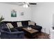 Comfortable living room featuring a large sectional sofa, hardwood floors and natural light at 1643 Mayfair Dr, Conover, NC 28613