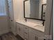 Bathroom with double sink vanity featuring white marble counters and contemporary finishes at 1939 Hendricks St, Rock Hill, SC 29732