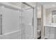 Bathroom featuring glass-enclosed shower and double vanity with marble counters and modern fixtures at 1975 Old Wilkesboro Rd, Taylorsville, NC 28681