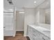 Bathroom with double vanity, marble countertop, shower, and modern fixtures at 1975 Old Wilkesboro Rd, Taylorsville, NC 28681