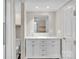 Bathroom with double vanity, marble countertop, modern lighting, toilet room, and shower/tub at 1975 Old Wilkesboro Rd, Taylorsville, NC 28681