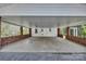 Spacious carport with brick pillars and ample room for parking at 1975 Old Wilkesboro Rd, Taylorsville, NC 28681