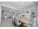 Open-concept dining room with seamless flow to the living area at 20202 Dovekie Ln, Indian Land, SC 29707