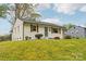 Charming single-story home featuring updated landscaping and a freshly painted exterior at 2138 Syracuse Dr, Charlotte, NC 28216