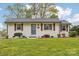 Charming, renovated single-story home featuring updated landscaping and a freshly painted exterior at 2138 Syracuse Dr, Charlotte, NC 28216