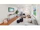 Bright living room with hardwood floors, modern furnishings, and an open floor plan at 2138 Syracuse Dr, Charlotte, NC 28216
