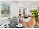 Open-concept living space featuring hardwood floors, modern furnishings, and plenty of natural light at 2138 Syracuse Dr, Charlotte, NC 28216