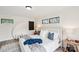 Main bedroom with white paneled walls, side tables with lamps, and a grey area rug at 2138 Syracuse Dr, Charlotte, NC 28216