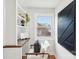 Bright office nook with built in shelving and desk illuminated by natural light from the window at 2138 Syracuse Dr, Charlotte, NC 28216