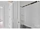 Bathroom with a new shower and tub combo and new white paint at 2628 S Main St, Kannapolis, NC 28027