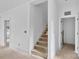 Unfinished staircase with neutral walls, leading to the next level of the home, awaiting personalization at 2628 S Main St, Kannapolis, NC 28027