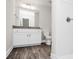 Modern bathroom features a vanity with granite countertops and stylish flooring at 2628 S Main St, Kannapolis, NC 28027