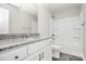 Bathroom featuring granite countertops, white cabinets, and a tub-shower combo at 2628 S Main St, Kannapolis, NC 28027