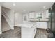 Bright kitchen featuring a central island, stainless appliances and stone countertops at 2628 S Main St, Kannapolis, NC 28027