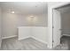 A bright loft area is filled with cozy carpeting and neutral colors at 2628 S Main St, Kannapolis, NC 28027