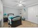 Well-lit bedroom showcasing a double bed and neutral decor at 273 S Downs Way, Fort Mill, SC 29708