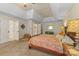 Bedroom featuring a trey ceiling, access to walk-in closet and full-length mirror at 273 S Downs Way, Fort Mill, SC 29708