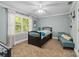 Comfortable bedroom featuring a large window and cozy seating area at 273 S Downs Way, Fort Mill, SC 29708