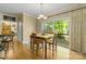 Cozy breakfast nook with natural light, table with seating, and a view of the outdoor deck at 273 S Downs Way, Fort Mill, SC 29708