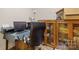 Functional office space with built-in cabinets and a comfortable chair at 273 S Downs Way, Fort Mill, SC 29708