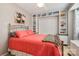 Well-lit bedroom with cozy decor, built-in shelving, and a comfortable-looking bed at 2756 Von Thuringer Ct, Charlotte, NC 28210
