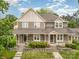 Beautiful two-story home with a welcoming front porch and manicured landscaping at 2756 Von Thuringer Ct, Charlotte, NC 28210
