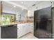 Contemporary kitchen with stainless steel appliances and granite countertops at 2756 Von Thuringer Ct, Charlotte, NC 28210