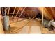 Unfinished attic space with exposed beams, insulation, and utilities, offering potential for customization at 3011 Patrick Place Cir, Clover, SC 29710