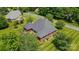 Spacious backyard featuring a well-maintained lawn, deck, patio, and dark metal perimeter fencing at 3011 Patrick Place Cir, Clover, SC 29710