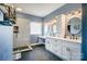 Modern bathroom featuring a double vanity, black hexagon tile flooring, and a glass-enclosed shower at 3011 Patrick Place Cir, Clover, SC 29710