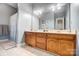 Elegant bathroom featuring double sinks with vanity, tile floor and a shower/bath at 3011 Patrick Place Cir, Clover, SC 29710
