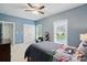 Comfortable bedroom with light blue walls, carpet, and natural light at 3011 Patrick Place Cir, Clover, SC 29710