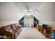 Bonus room with built-in bookcases, a ceiling fan, and lots of space for various activities at 3011 Patrick Place Cir, Clover, SC 29710