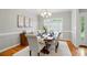 Cozy dining room featuring hardwood floors, neutral walls, and a view of the outdoors at 3011 Patrick Place Cir, Clover, SC 29710