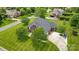 Charming two-story brick home with a concrete driveway and a beautifully landscaped front yard at 3011 Patrick Place Cir, Clover, SC 29710