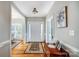 Inviting foyer with hardwood floors, soft gray walls, and elegant details create a warm and welcoming entrance at 3011 Patrick Place Cir, Clover, SC 29710