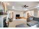 Spacious living room with fireplace, and a large sectional, perfect for gatherings and cozy nights at home at 3011 Patrick Place Cir, Clover, SC 29710