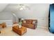 Light-filled living room with comfortable seating, table, and view of the landing at 3011 Patrick Place Cir, Clover, SC 29710