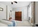 Bright bedroom with natural light, a spacious layout, and a large armoire for storage at 3095 Foggy Hollow Ln, Clover, SC 29710