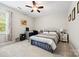 Cozy bedroom with a comfortable bed, neutral decor, and a functional workspace at 3095 Foggy Hollow Ln, Clover, SC 29710