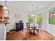Bright breakfast nook with hardwood floors and plenty of natural light, adjacent to the kitchen at 3095 Foggy Hollow Ln, Clover, SC 29710