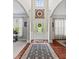 Elegant foyer with hardwood floors, high ceilings, and decorative rug, creating a grand entrance at 3095 Foggy Hollow Ln, Clover, SC 29710