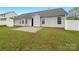 The backyard features a concrete patio, offering space for outdoor relaxation and entertainment at 4147 Timberwood Dr, Gastonia, NC 28056
