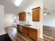 Bright kitchen with stainless steel appliances, wood cabinets, and stone countertops at 4147 Timberwood Dr, Gastonia, NC 28056