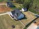 Aerial view of the property featuring a well-manicured lawn and an adjacent outbuilding at 4189 Brandy Creek Ct, Clover, SC 29710